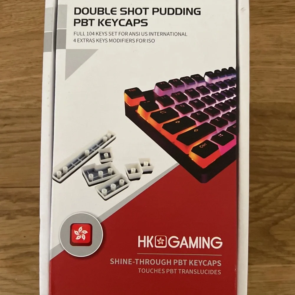 A keyboard (rk61) and keycaps (HK Pudding Keycaps)